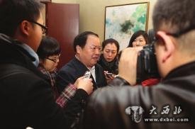 全国政协委员、国家工商总局局长周伯华接受记者采访(资料图 )